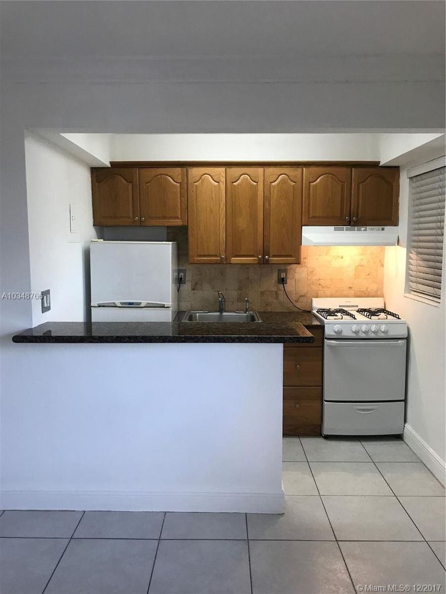 Cozy 1/1 in the heart of Coral Gables, blocks from Miracle Mile. Tile floors throughout and granite countertops in the kitchen. New gas stove and freshly painted. Walk in closet. Building has pool & laundry facility. Great location. Close to shops, restaurants and airport. Gas and water are included.