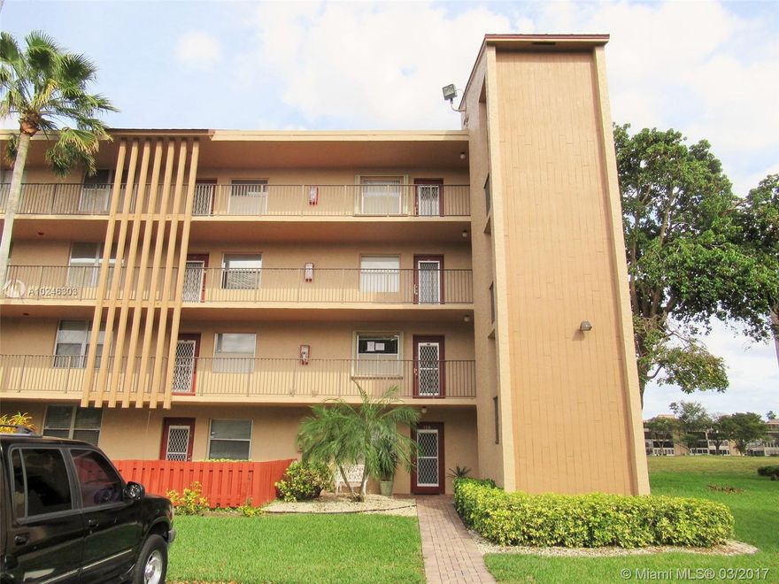 Lots of Potential in this Spacious 2/2 Unit with Wood & Tile Floors Thru-Out! Enclosed Patio Adds Living Space - Perfect for Entertaining or for Grandkids to Play! Washer & Dryer Hook-Ups in Unit - No Dragging Laundry to a Community Laundry Rm! Unit Conveniently Located Next to the Stairs or Take Bldg Elevator to Get Up & Down Quickly! Pet Friendly Community Features Lots of Amenities that Make it Easy to Stay Active: Pool, Fitness Center, Tennis, & More! Assoc. States 55+ Community & 650+ Credit Score.