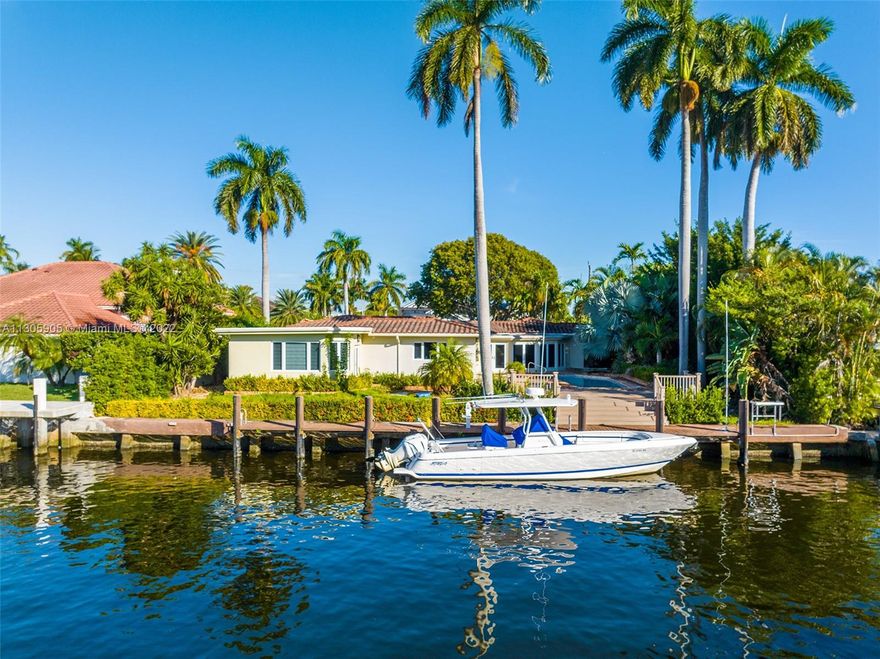 Rarely available, a beautiful 13,000 square foot lot with 100' of waterfrontage on Pelican Drive. Plan to build your dream home, or move right into the current remodeled home.