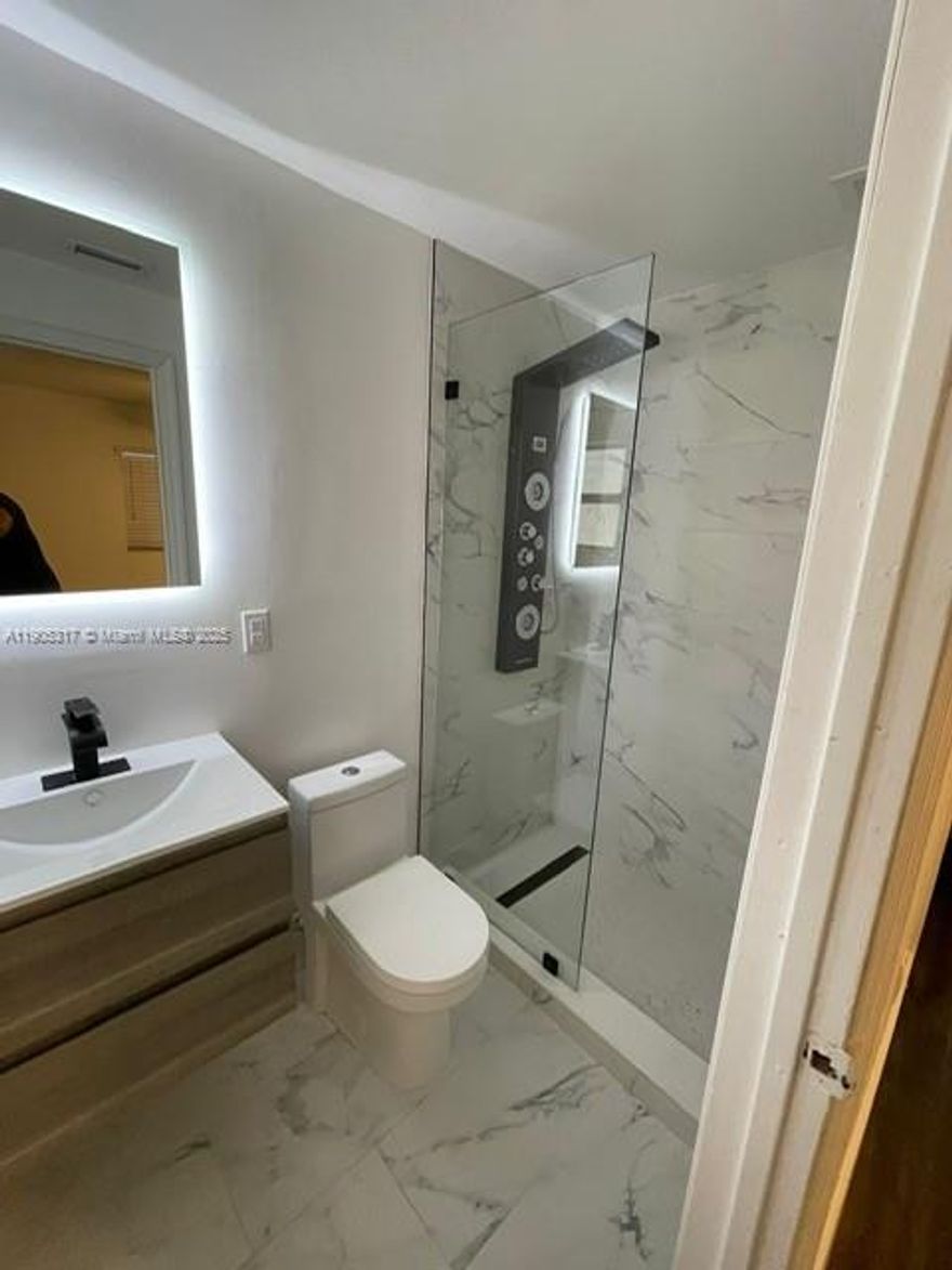 Beautiful and spacious 3-bedroom, 2-bath single-family home located in a quiet Homestead neighborhood. Features an open floor plan, modern kitchen with stainless steel appliances, washer and dryer, and a large fenced backyard with an electric gate and a mature mango tree that produces amazing fruit. Driveway for multiple cars. Easy to show. Monthly rent: $3,200.