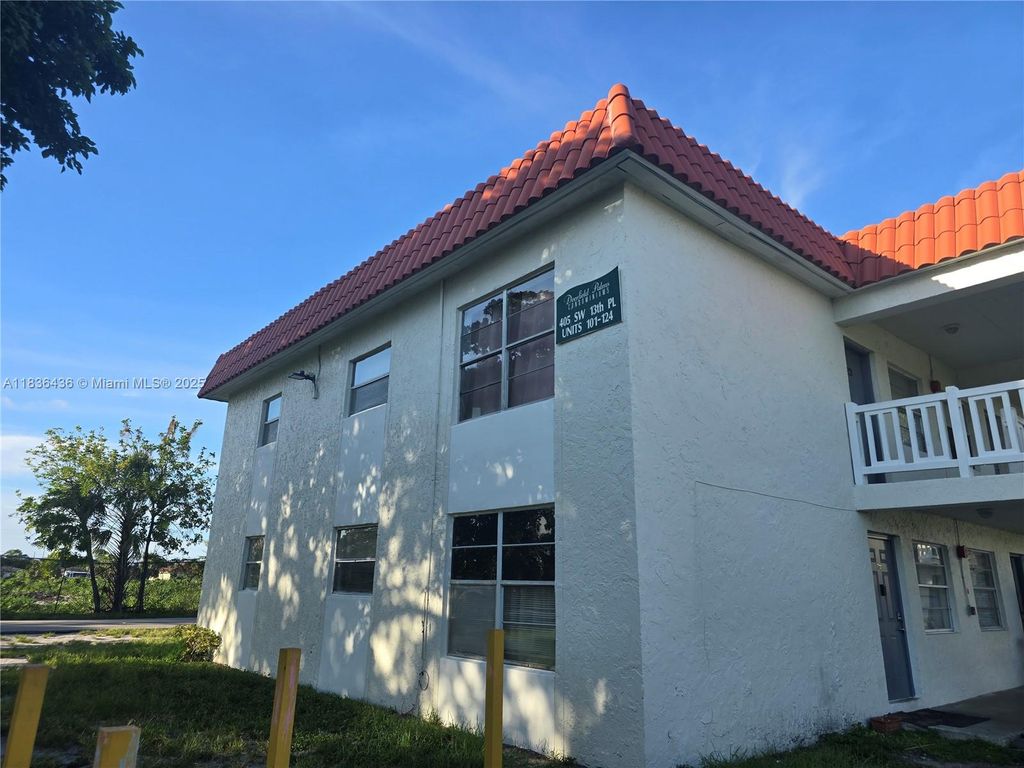 Photo of 405 SW 13th Pl #115, Deerfield Beach, FL 33441 (MLS # A11836436)