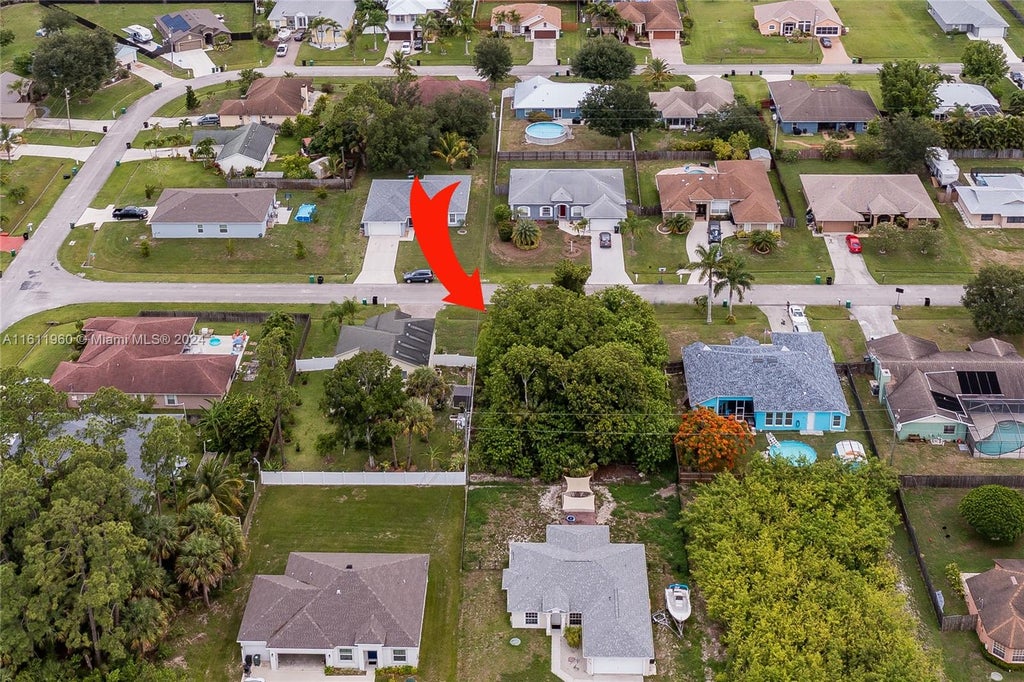 Photo of 2179 SW Pruitt St, Port Saint Lucie, FL 34953 (MLS # A11611960)