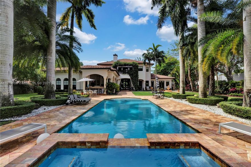 This elegant and sophisticated European Transitional masterpiece sits on a rare deep acre lot. This beautiful Pinecrest home is surrounded by a beautifully manicured botanical garden, created by Jungle B’s landscapers from Homestead. You will find that this 6 Bed. /5.1 Bath, home utilizes its 6,613 sq. ft. of living area in a very useful and elegant manner. Every bit of space serves a valuable purpose, and no living area goes to waste. This home is great for your family to enjoy, and fantastic for you to entertain your guests. Indoor garage for 3 cars. This property also comes with a brand new stand-by home generator that will power your entire home for days. Walking distance to all three A-Rated Palmetto schools, less than a ten-minute drive to most top private schools in the area.