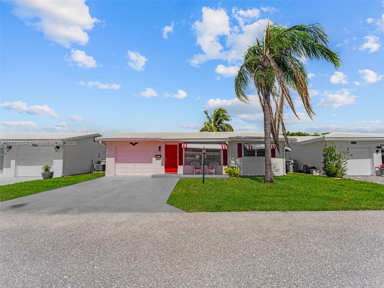 Gorgeous fully renovated single-family home in the heart of Pompano Beach! Bright, spacious layout with a beautifully updated kitchen, living area, and 1-car garage. Just 3 miles from the beach with easy access to shopping, dining, and major highways. Located in a verified 55+ community east of I-95 offering FREE golf on a 9-hole Par 3 course, shuttle service, exterior house painting, water, sprinklers, 2 pools, 2 clubhouses, walking/biking trails, and well-maintained common areas. Pet-friendly. Minutes from 3 beaches, horse racing, casino, and top-rated restaurants. Live the South Florida lifestyle to the fullest!