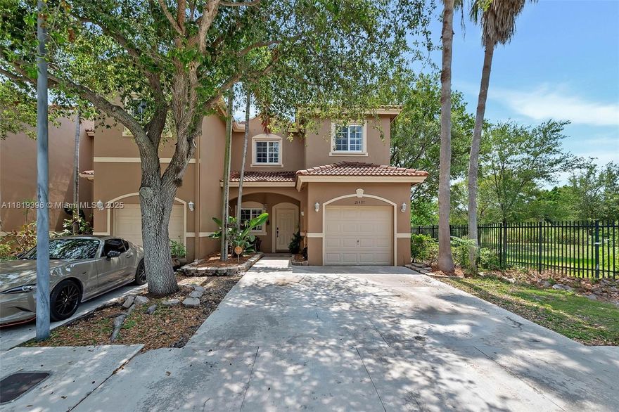 Beautifully updated 2-story, 3 bdrm/2.5 bath corner unit townhome in the lovely gated community of Santa Barbara. Formal living/dining area. Tastefully remodeled kitchen w/ white cabinetry, quartz countertops, tile backsplash, farmhouse sink & eat-in snack bar, opens to the family rm w/ doors out to the spacious fenced patio. Powder room. Impact windows/ doors, plantation shutters, crown molding. Neutral tile downstairs, vinyl floors upstairs. All bedrooms are located upstairs. Two nicely-sized guest bdrms & updated guest bath. Generously sized primary suite w/ walk in closets, double sinks, glass enclosed shower.  1-car garage with laundry area. Community pool & playground, visitor parking. Close to nearby parks, schools.