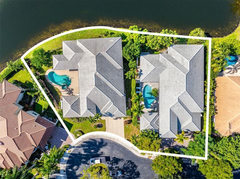 Photo of 6451 NW 32nd Way, Boca Raton, FL 33496 (MLS # A11916994)