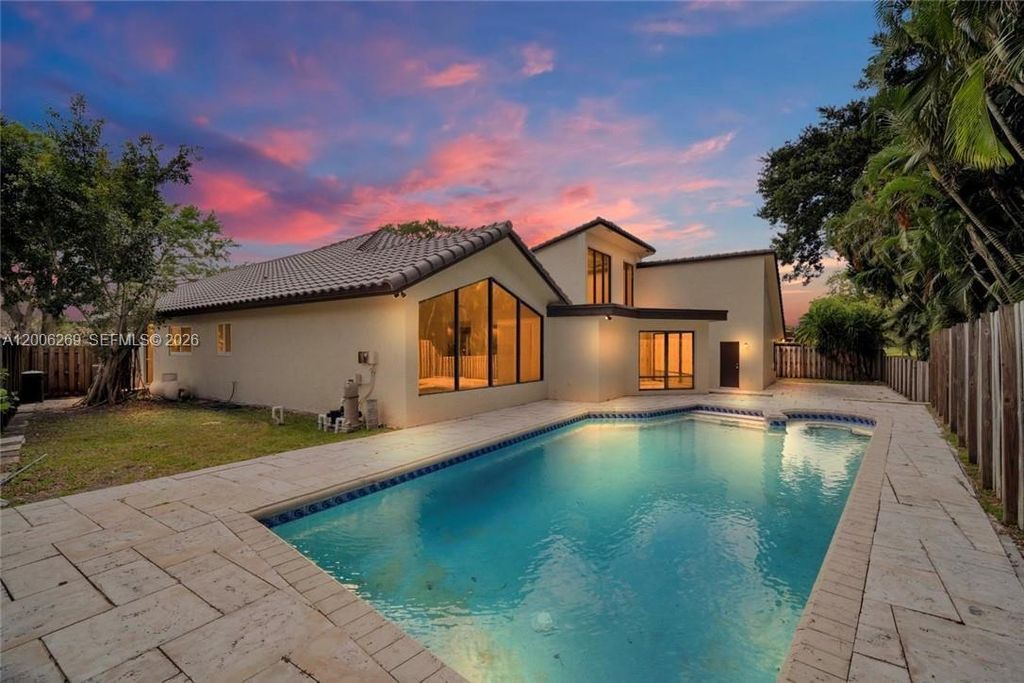 Photo of 8881 N Lake Dasha Dr, Plantation, FL 33324 (MLS # A12006269)