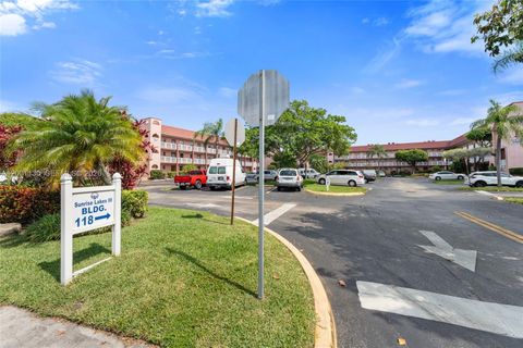 Photo of 9401 Sunrise Lakes Blvd #307, Sunrise, FL 33322 (MLS # A12001130)