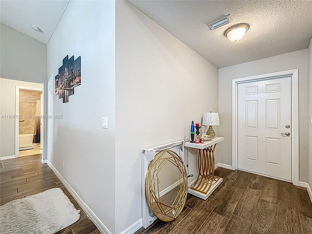 Photo of 6142 NW Hopkins Ave, Port St Lucie, FL 34986 (MLS # A11906729)