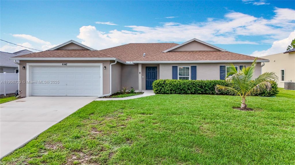 Photo of 6142 NW Hopkins Ave, Port St Lucie, FL 34986 (MLS # A11906729)