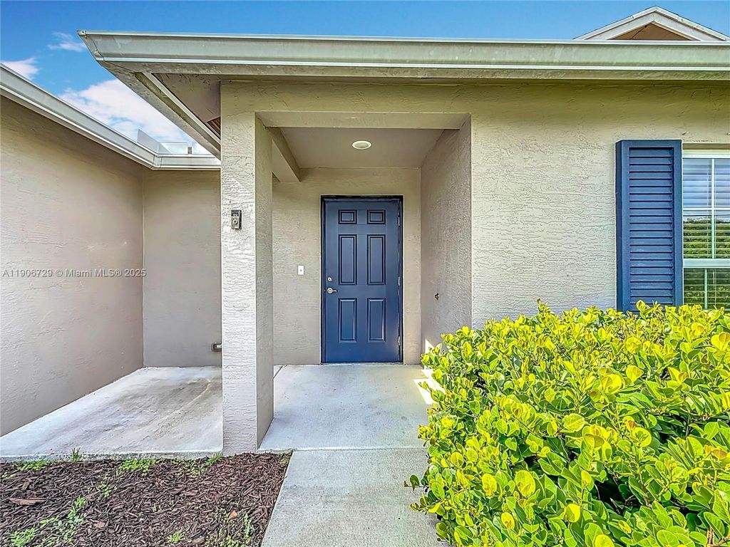 Photo of 6142 NW Hopkins Ave, Port St Lucie, FL 34986 (MLS # A11906729)