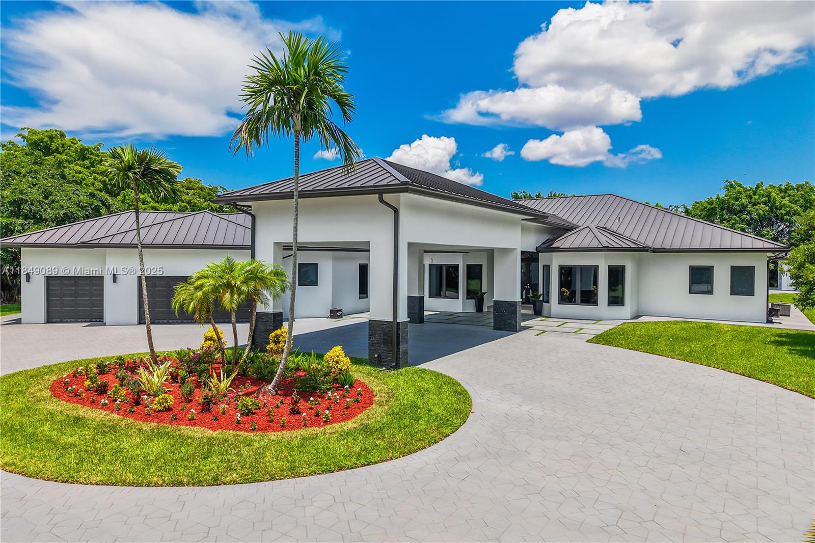 Welcome to this spectacular estate in prestigious Saddle Club Estates—an exclusive 2.47-acre gated retreat, fully fenced and secured with an automatic gate for ultimate privacy. This fully renovated masterpiece offers 6 bedrooms, 6.5 bathrooms, and over 7,500 sq. ft. of total construction. Features include travertine floors, impact windows, and a modern chef’s kitchen. The luxurious primary suite has dual bathrooms. Enjoy a resort-style pool, heat pump spa, and a stunning gazebo with guest house, outdoor kitchen, and full bath. NEW metal roof, 4 new A/C units, 3 water heaters, and a 3-car garage.