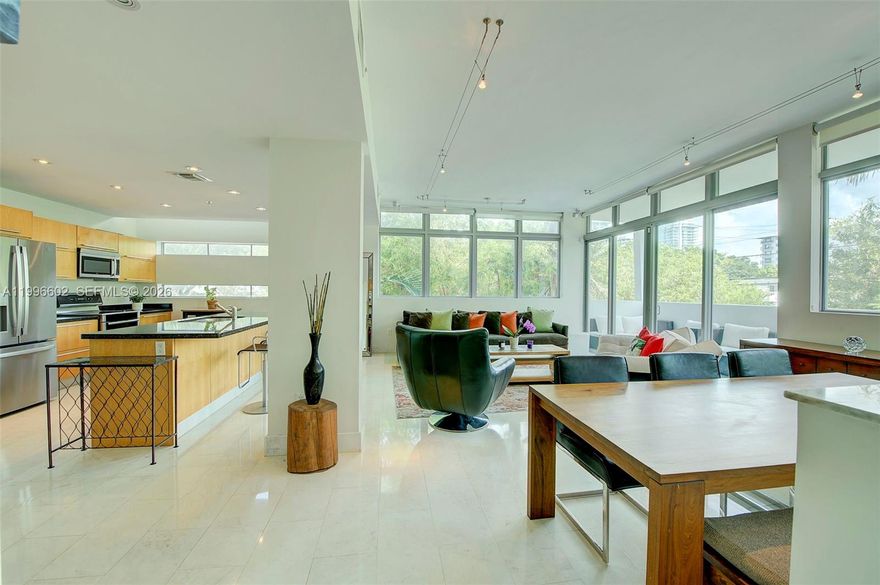 One-of-a-kind ultra-modern loft-style townhome in award-winning SoBe Bay. Oversized 2BR/2.5BA corner unit with soaring ceilings, walls of glass, and three spacious outdoor terraces plus a lush 700 SF private garden. Light-filled interiors feature white marble floors downstairs, cherry wood upstairs, recessed lighting, and a chef's kitchen with top-of-the-line appliances. Upstairs bedrooms boast generous closets and spa-like baths. Includes 2 private parking spaces, in-unit W/D, BBQ, plunge pool. Prime location at 16th & Bay Rd—close to Lincoln Rd, Sunset Harbour, and the beach. Available starting June 8 through October 15. Fully furnished.