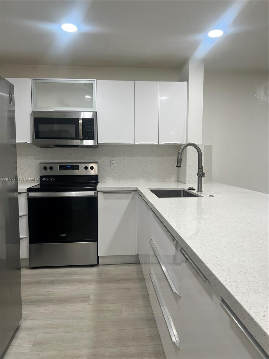 WOODSIDE IN KENDALL CONDO - Residential Lease