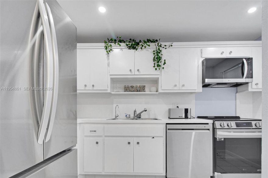 Live in this reimagined East Boca Condo , mintues to Pristine beaches, Mizner Park & Downtown Boca. Close to Premier Dining & Shopping, Immaculate 2 Bedroom , 2 Bath with split Floor Plan, perfect for hosting guests . LOCATED ON 5 ACRES JUST 1 BLOCK AWAY FROM THE BOCA DOWNTOWN REDEVELOPMENT SITE;GREAT INVESTMENT !Walk to Boca Tennis Center. Professionally Remodeled ,no detail overlooked ! NEW LG Smart appliances; Covered Carport ; 55 plus community of land over   with  beautiful Gardens, set back for Privacy . Offered Furnished , essentials inventory to be attached  / Turnkey ; just bring your suitcase ! Assessments have been paid. Emotional Support pet ok..The Perfect Spot East Boca