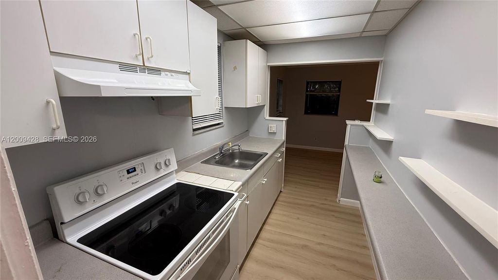 Photo of 1725 Roosevelt St #Rear Cottage, Hollywood, FL 33020 (MLS # A12009428)