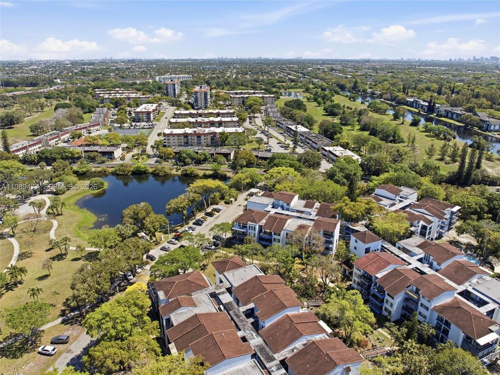 Photo of 6010 S Falls Cir Dr #323, Lauderhill, FL 33319 (MLS # A11989477)