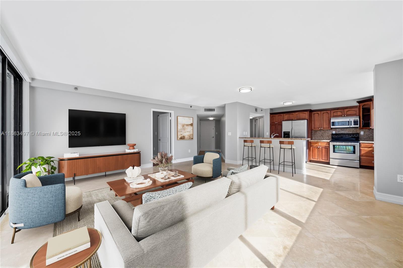 Experience luxury living in this beautifully renovated corner residence at Brickell Key Two, one of Miami’s most sought-after addresses. Spanning approximately 1,200 sq. ft., this light-filled home showcases stunning city and water views from every angle. The interiors feature a designer remodel with wood cabinetry, granite countertops, stainless steel appliances, and a combination of marble and wood flooring.
Residents enjoy resort-style amenities and a recently redesigned lobby, all just steps—or a quick trolley ride—from Brickell’s premier shopping and dining destinations. This residence also includes two assigned covered parking spaces. A truly exceptional opportunity in the heart of Brickell Key.