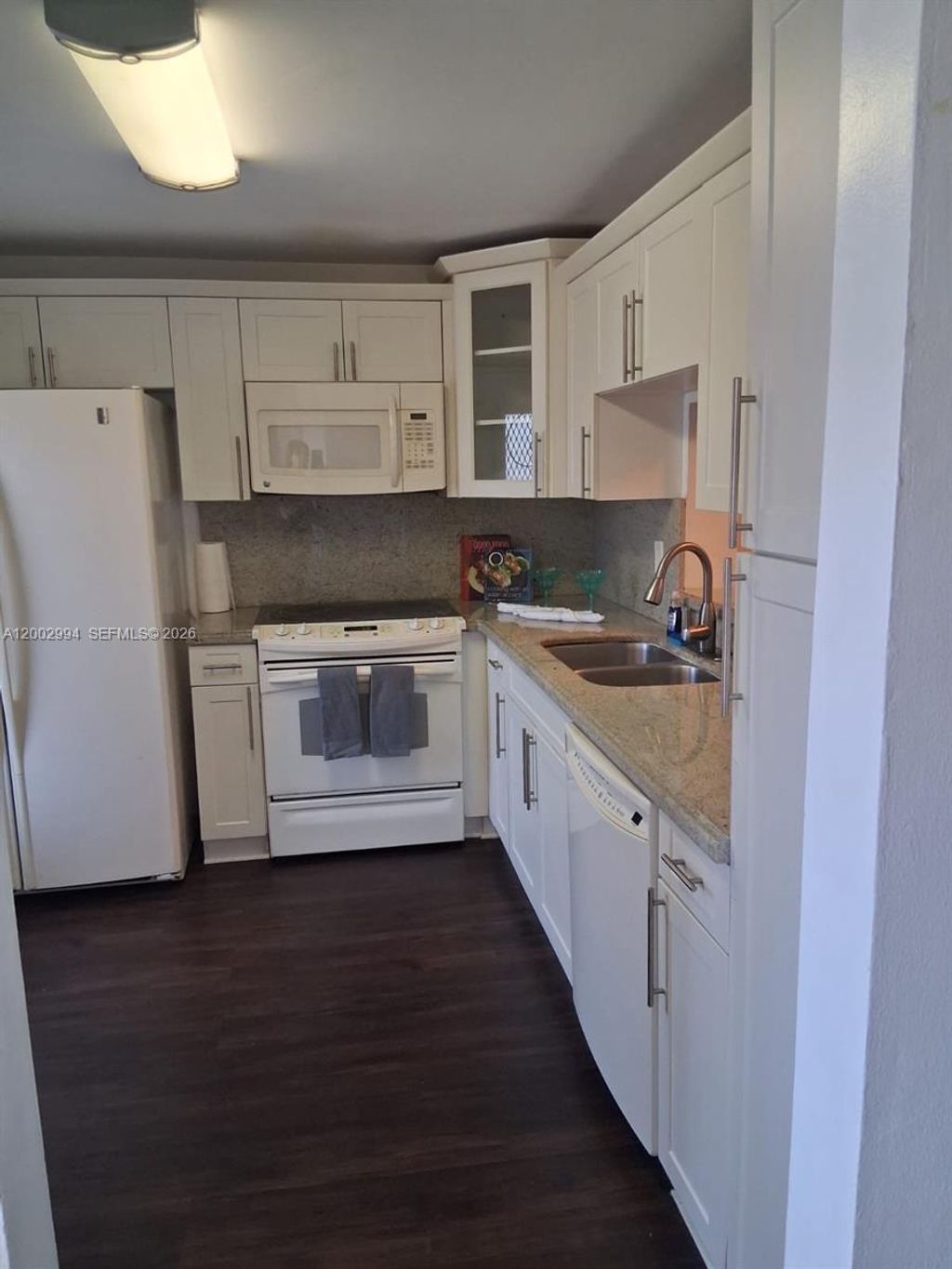 Photo of 301 NE 14th Ave #202, Hallandale Beach, FL 33009 (MLS # A12002994)