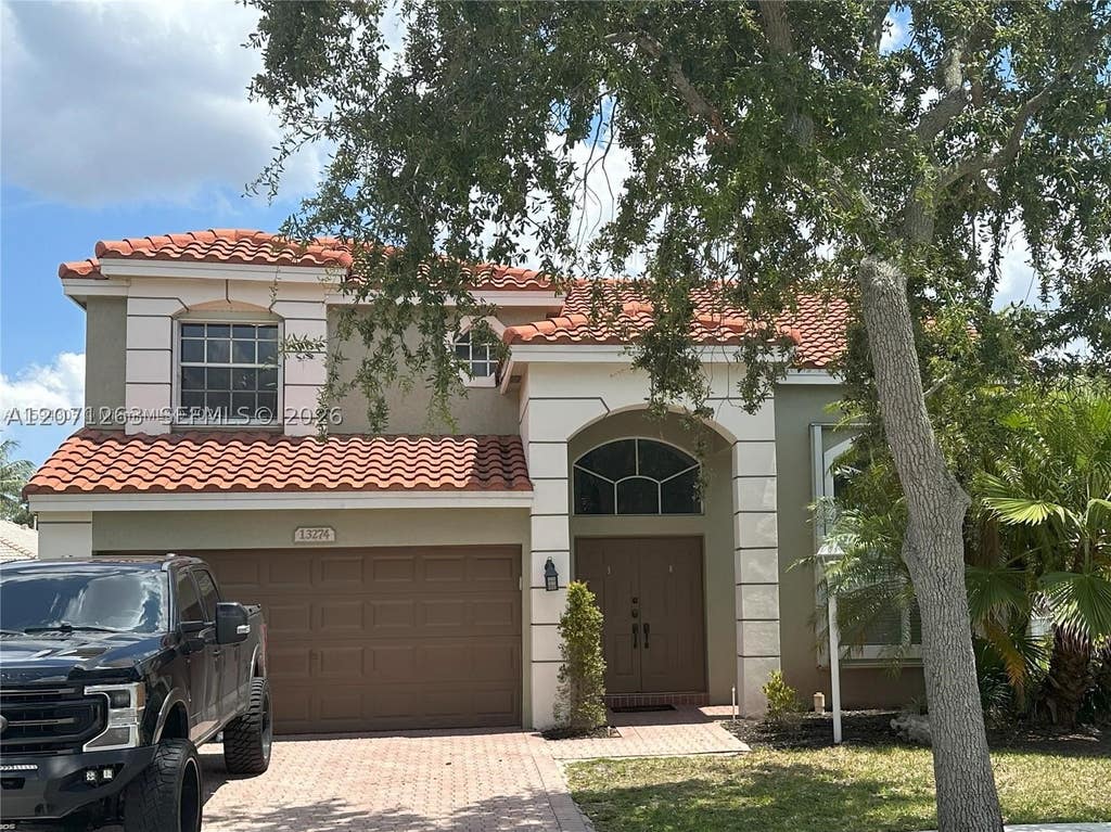 Photo of 13274 NW 15th Ct, Pembroke Pines, FL 33028 (MLS # A12071263)