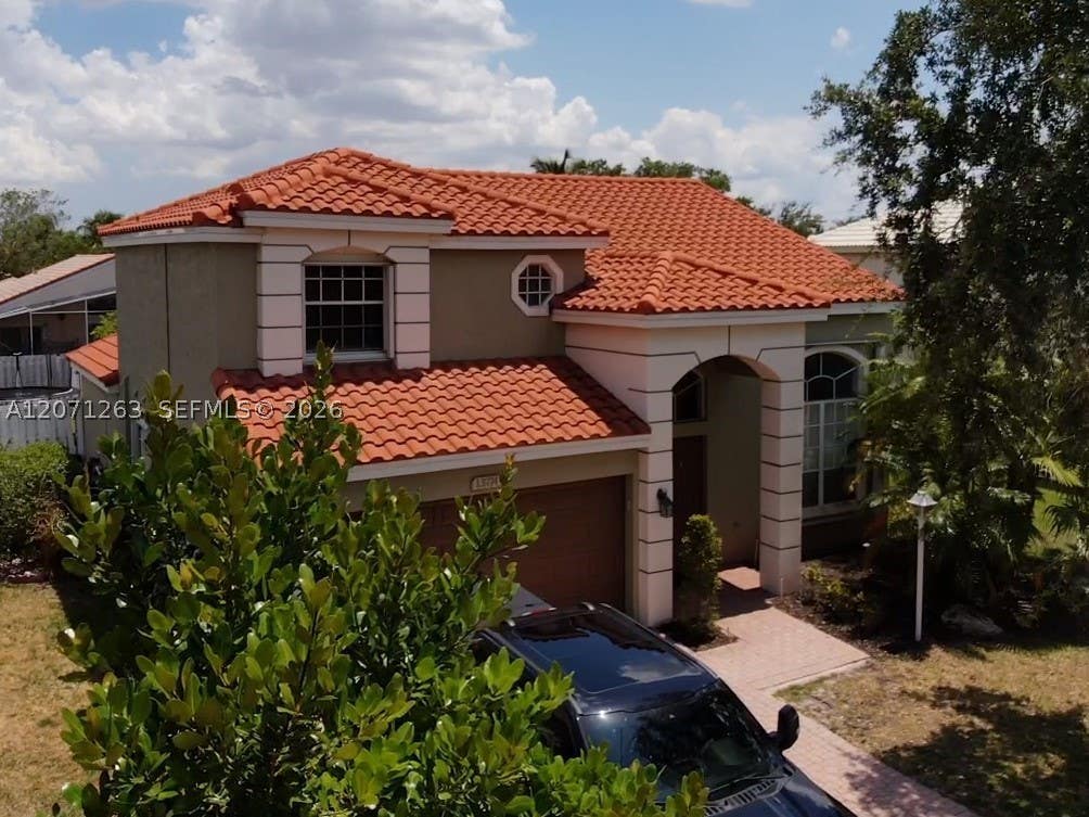 Photo of 13274 NW 15th Ct, Pembroke Pines, FL 33028 (MLS # A12071263)