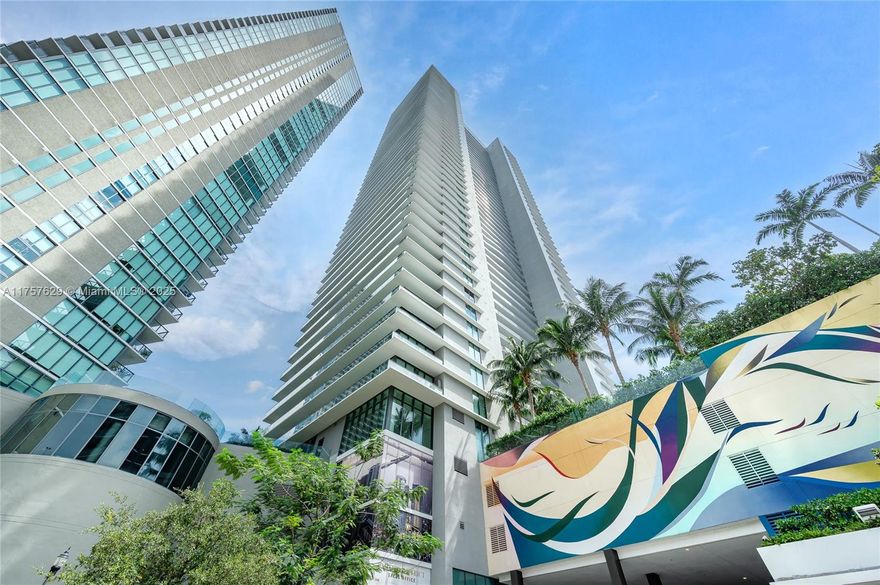 GORGEOUS 2-BED, 3-BATH UNIT WITH A DEN AND TWO PARKING SPACES! Enjoy breathtaking bay views from this stunning residence featuring beautiful ceramic floors, Italcraft closets, electric blinds, soaring 10-ft ceilings, high-end appliances, and sleek marble countertops. Located in Gran Paraiso, a luxury community spanning nearly 10 acres, offering world-class amenities including tennis courts, a bowling alley, a game room, a state-of-the-art gym, a spa, a party room, a kids' room, and more.
Situated in the heart of Miami, just minutes from the Design District, Wynwood, Downtown, and South Beach. Don’t miss this incredible opportunity!