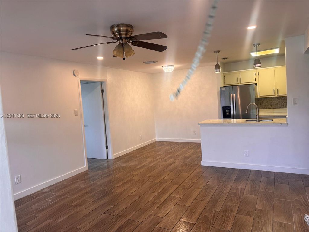 Photo of 10023 Winding Lake Rd #204, Sunrise, FL 33351 (MLS # A12011399)