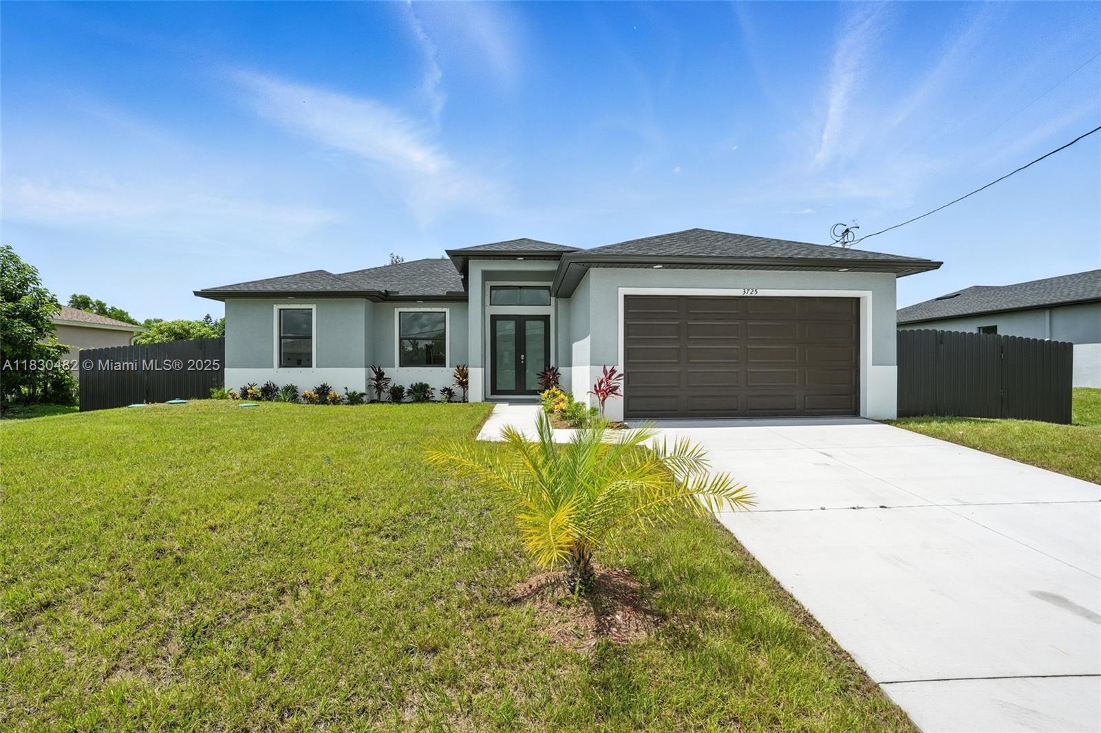 Brand New Home in Lehigh Acres – No HOA & Great Location! This beautiful home offers nearly 1,500 SQFT of modern living with 3 bedrooms, 2 bathrooms, tray ceilings, tile flooring, and a 2-car garage. The kitchen features quartz countertops and ample cabinetry, perfect for daily life and entertaining. The spacious primary suite includes a double vanity and large walk-in shower. Enjoy a fully fenced, oversized backyard with space for a dream pool. No HOA. Not in a flood zone. Located just off Lee Blvd with quick access to I-75, Fort Myers, RSW Airport, and shopping—plus walking distance to a nearby school. Move-in ready and priced to sell!