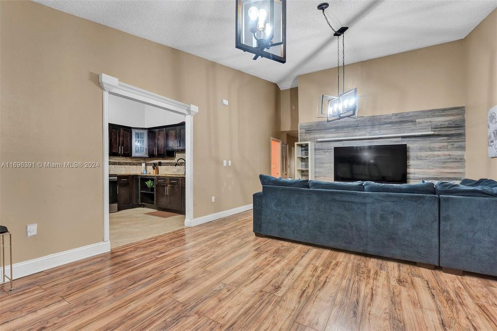 Photo of 3880 NW 77th Ave #3880, Sunrise, FL 33351 (MLS # A11696391)