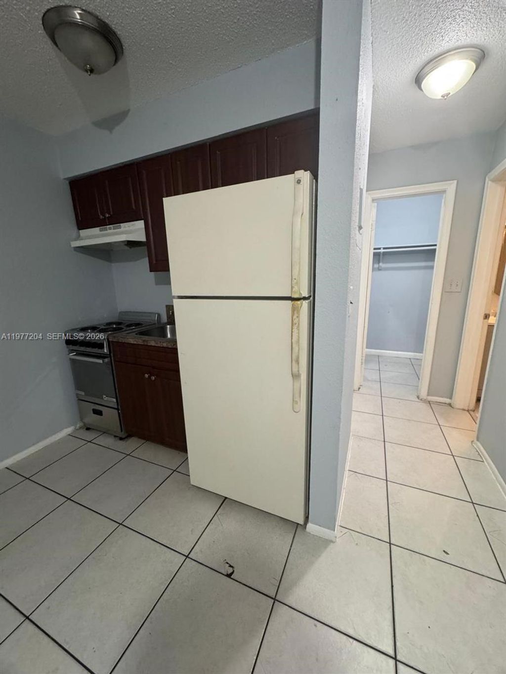 Photo of 4019 NW 31st Ave #5, Lauderdale Lakes, FL 33309 (MLS # A11977204)