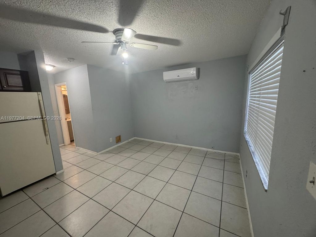 Photo of 4019 NW 31st Ave #5, Lauderdale Lakes, FL 33309 (MLS # A11977204)