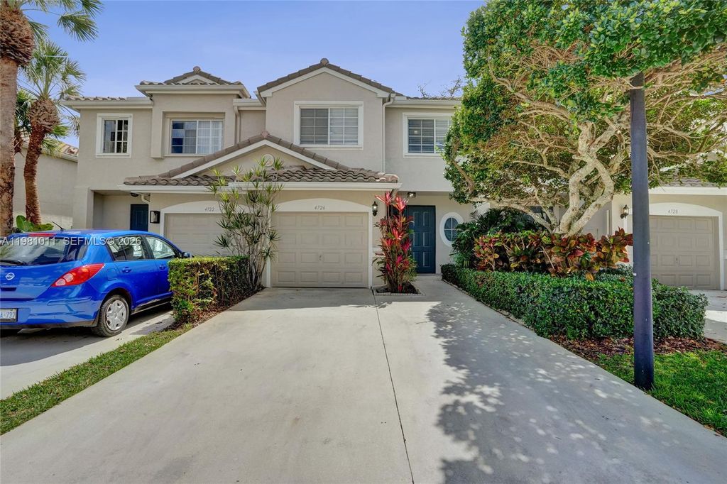 Photo of 4726 NW 59th Mnr, Coconut Creek, FL 33073 (MLS # A11981011)