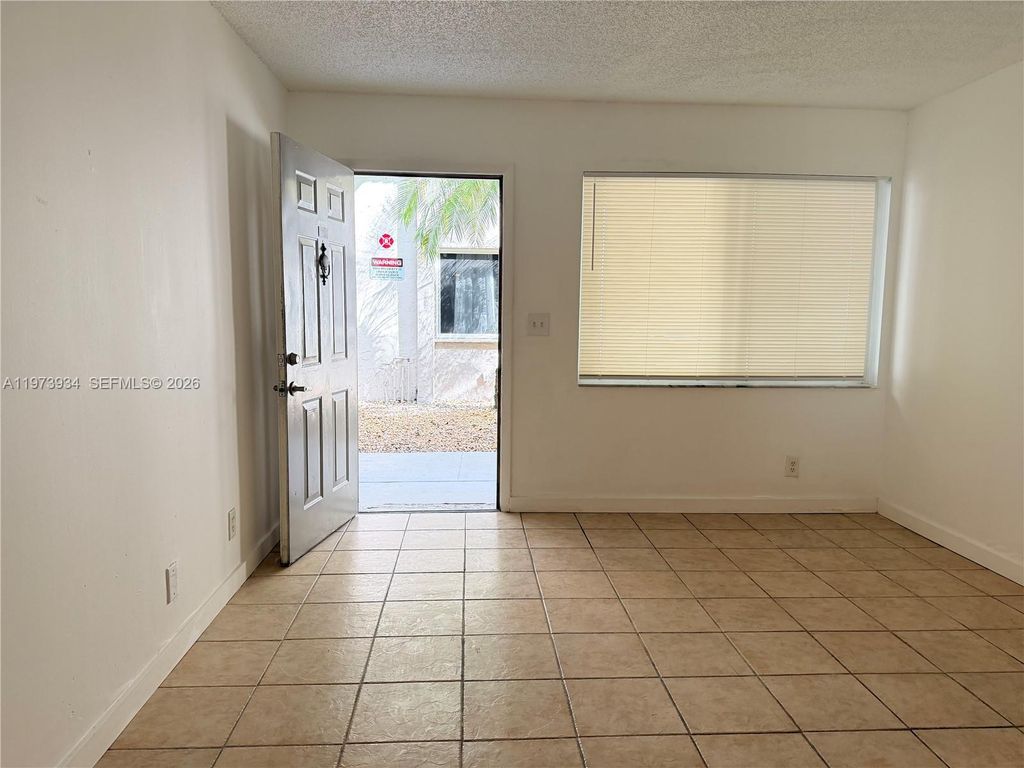 Photo of 3215 NW 102nd Ter #3215, Coral Springs, FL 33065 (MLS # A11973934)