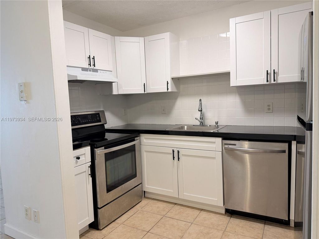 Photo of 3215 NW 102nd Ter #3215, Coral Springs, FL 33065 (MLS # A11973934)
