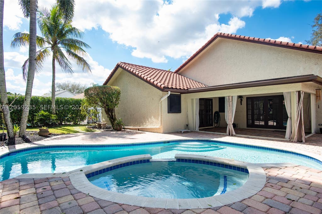Photo of 3160 Peachtree Cir, Davie, FL 33328 (MLS # A12059235)