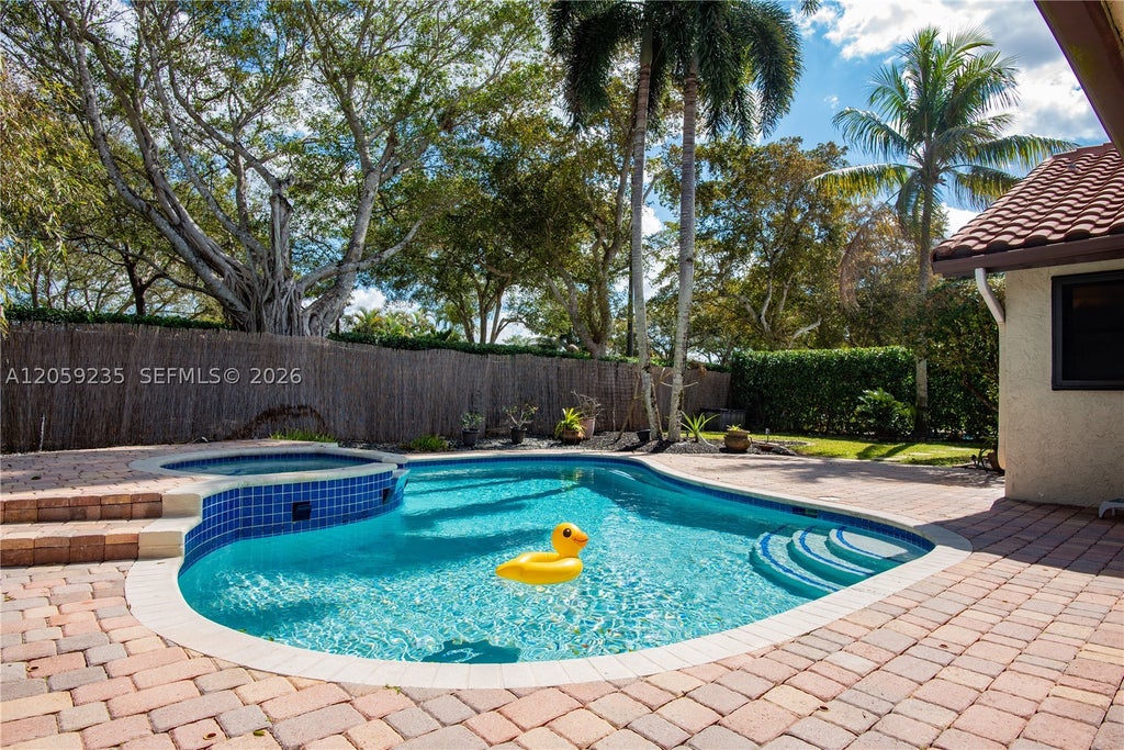 Photo of 3160 Peachtree Cir, Davie, FL 33328 (MLS # A12059235)