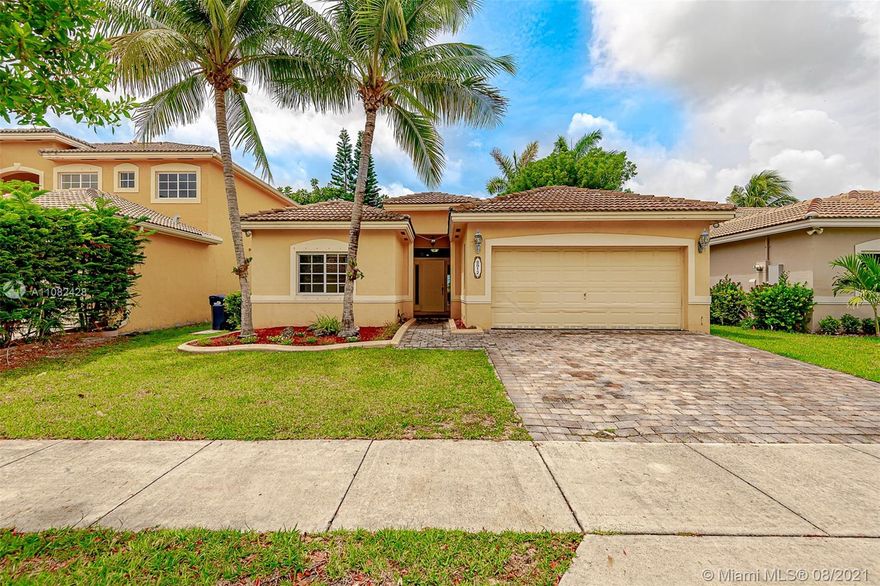 Beautiful three bedroom home sitting directly on the lake in the great neighborhood of Pelican Bay At Old Cutler Lakes. Home features some of the best lake views in the entire community! Spacious home has impressive master suite. Home is excellent for entertaining, features large outdoor space situated on a perfect view of the lake. Large two car garage and separate laundry room. Home also features two good sized guest rooms. Pelican Bay at Old Cutler Lakes is a safe and desirable living experience. HOA payments are low and community is kept in excellent shape at all times.