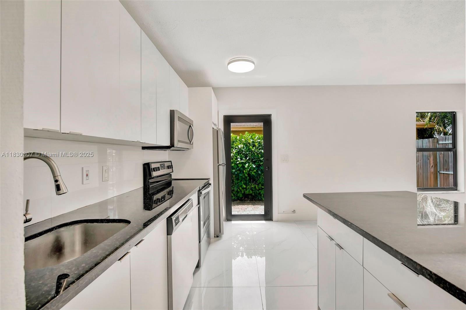 Granite kitchen, stainless steel appliances, porcelain floors, high-impact windows, small private patio in an excellent NE location. This 750-square-foot apartment has 1 bedroom and 1 bathroom. Located near restaurants and supermarkets, just 9 minutes from the beach. MAKE THIS YOUR NEW HOME!