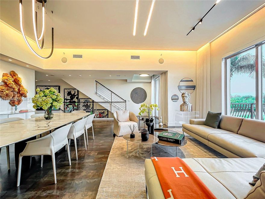 Beachfront luxury awaits at Villa V, a fully remodeled 3-level residence designed by Estudio Jorge Fuentes. This approx. 2,700 SF villa offers 2 bedrooms, 2.5 baths, plus entertainment room ideal for guest use, home office, or media suite, private elevator, and a deeded 2-car garage. The residence features paneled living areas, a bespoke kitchen, and fully customized, floor-to-ceiling closets and millwork throughout. Spa-inspired baths include LED mirrors, smart toilets, steam shower, and a custom dry sauna in the top-level primary suite. Additional highlights include new self-locking door systems throughout, integrated home automation, security system, cameras, and motorized window treatments. Ideally located at the end of the boardwalk, offering effortless daily beach walks and exercise. Minutes from Fort Lauderdale Airport, luxury shopping, dining, and entertainment. Art and furniture not included.