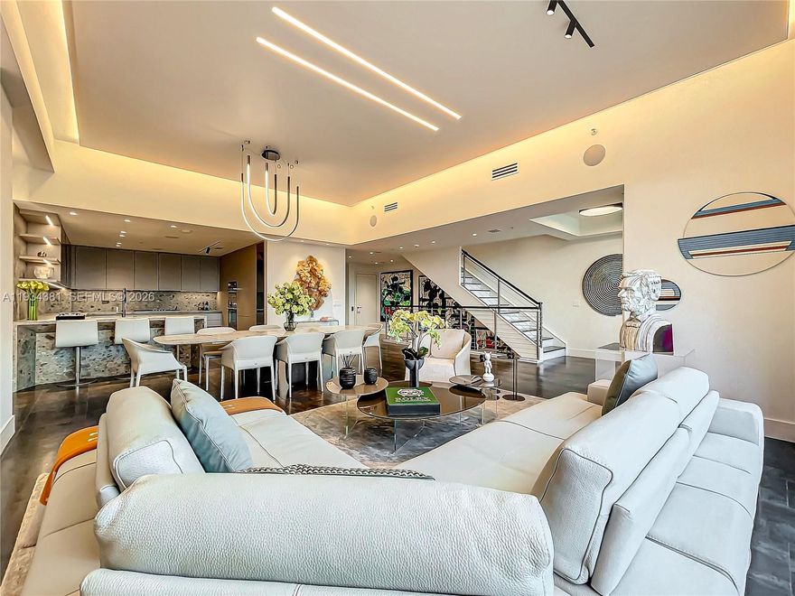 Beachfront luxury awaits at Villa V, a fully remodeled 3-level residence designed by Estudio Jorge Fuentes. This approx. 2,700 SF villa offers 2 bedrooms, 2.5 baths, plus entertainment room ideal for guest use, home office, or media suite, private elevator, and a deeded 2-car garage. The residence features paneled living areas, a bespoke kitchen, and fully customized, floor-to-ceiling closets and millwork throughout. Spa-inspired baths include LED mirrors, smart toilets, steam shower, and a custom dry sauna in the top-level primary suite. Additional highlights include new self-locking door systems throughout, integrated home automation, security system, cameras, and motorized window treatments. Ideally located at the end of the boardwalk, offering effortless daily beach walks and exercise. Minutes from Fort Lauderdale Airport, luxury shopping, dining, and entertainment. Art and furniture not included in the price but may be available for purchase separately