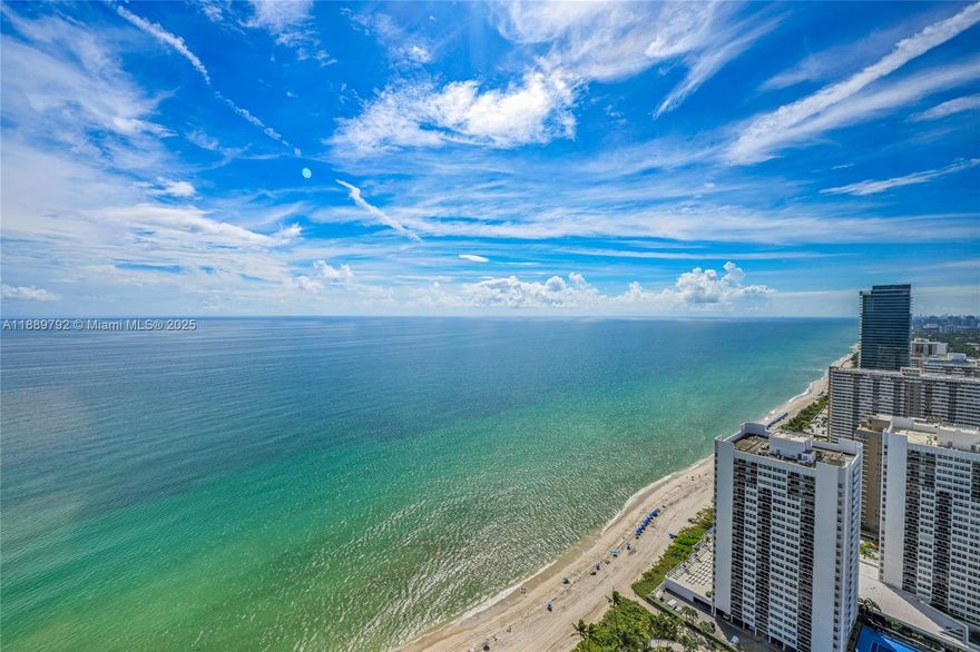 Stunning corner unit with direct ocean view! Spacious 2 bedrooms plus den and a completely remodeled kitchen. Available for 6-month rental only. Fully equipped and ready to move in — perfect seasonal getaway! Located in a 5-star oceanfront complex featuring a 40,000 SF full-service spa,  fitness center, concierge service, valet parking, and resort-style amenities. Enjoy luxury living at its best!