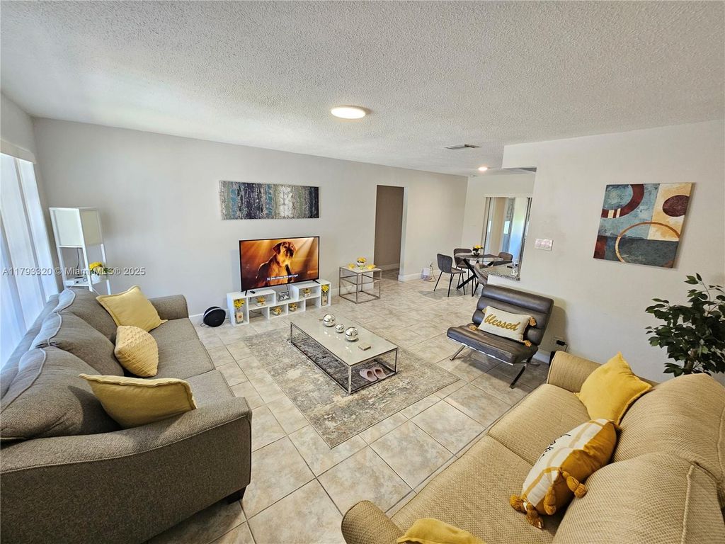 Photo of 4812 NW 49th Pl, Tamarac, FL 33319 (MLS # A11793320)