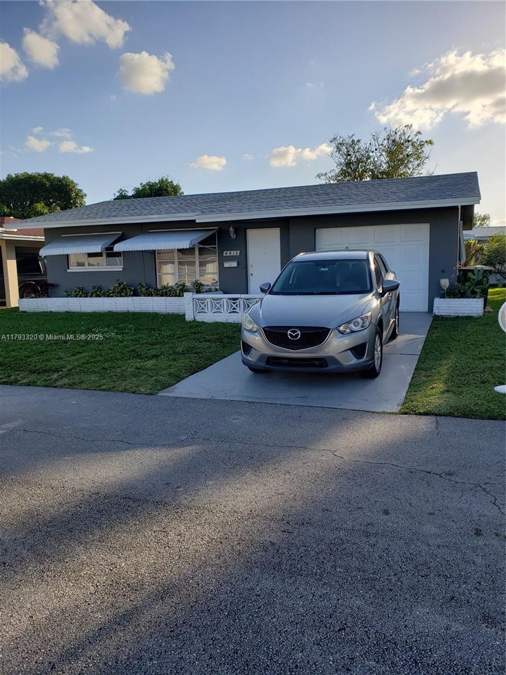 Photo of 4812 NW 49th Pl, Tamarac, FL 33319 (MLS # A11793320)