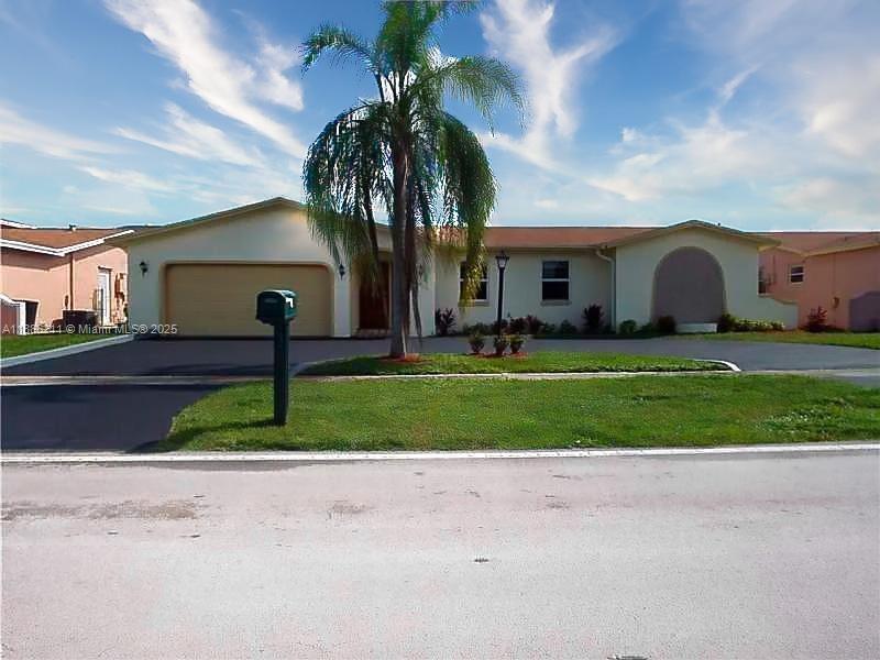 Spacious 4-bedroom, 2-bath pool home on a canal. This home offers multiple interior living and entertaining spaces, including a formal living room, dining area, family room, and updated kitchen with granite countertops. Both bathrooms have been tastefully renovated, adding to the home’s modern appeal. Exterior highlights include a circular driveway, partial hurricane-impact windows and doors, accordion shutters, and a gas generator. The oversized lot provides added space perfect for outdoor entertaining and waterfront views. Call and schedule your private showing today.