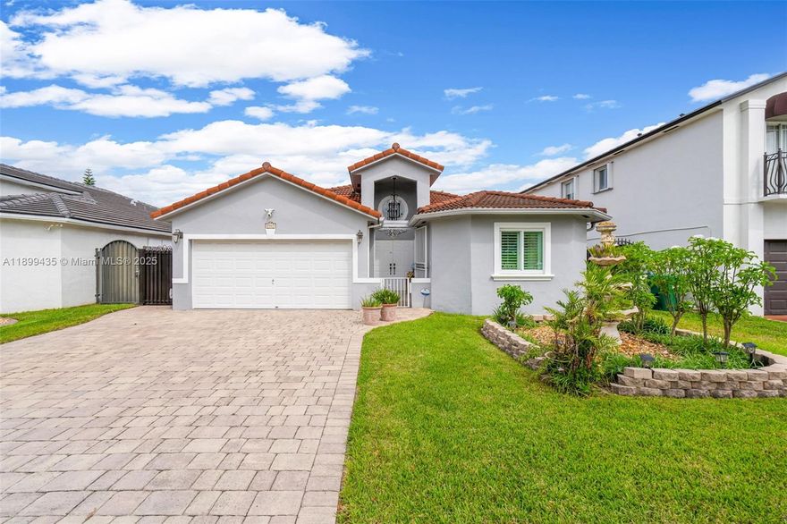 Welcome to this beautifully maintained and elegantly designed home featuring 3 spacious bedrooms, 2 luxurious bathrooms, and a 2-car garage. Step inside to discover a bright open-concept layout with high ceilings, abundant natural light, and quality finishes throughout. The gourmet kitchen is ideal for family gatherings and entertaining, offering ample counter space and a seamless flow to the dining and living areas. The primary suite provides a serene retreat with a spa-like bathroom and generous closet space. Enjoy outdoor living in the private backyard, perfect for relaxing or hosting guests. Located in a desirable, family-friendly neighborhood close to excellent schools, shopping, and major highways — this exceptional home combines comfort, style, and convenience in one perfect package