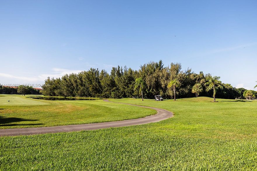 Welcome to this beautifully updated 2/2 unit w/a serene golf view that greets you as you enter the front door. oasts a contemporary kitchen with sleek, ceiling-high cabinets, quartz countertops, and brand-new appliances. Enjoy the beauty of brand-new vinyl flooring, freshly painted interiors, and elegant, bathrooms. Breathtaking views. Enjoy the convenience of an in-unit washer and dryer. The HOA is $512/month plus CVP $266/month, and includes water, cable, internet, and access to endless amenities, including a million-dollar clubhouse. Located in Buckingham East I at Century Village, one of Pembroke Pines most desirable 55+active adult communities—minutes from The Shops at Pembroke Gardens and major highways. Parking #31N