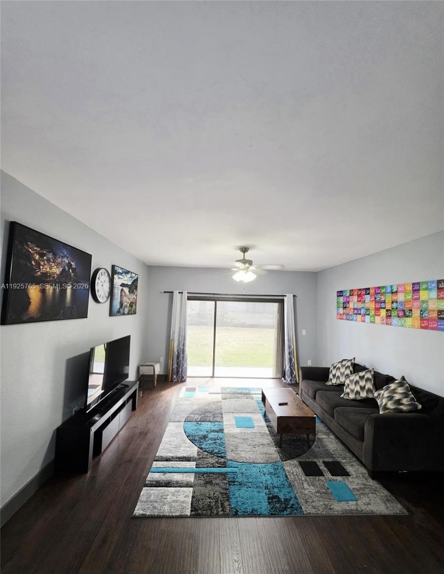 Bright and spacious 2-bedroom, 2-bath corner unit on the first floor, offering 1,451 sq ft of living space. Features include new premium laminate flooring (waterproof), a new AC and water heater (both with warranties), a new electrical panel, updated ceiling fans, and accordion hurricane shutters on all windows. Enjoy the convenience of an in-unit washer and dryer. Baptist Towers is a well-maintained building with secure lobby access, nestled in a tranquil setting yet close to major highways and area attractions. The building has passed its milestone inspection and boasts fully funded maintenance reserves with a new roof (2024). Move in with as little as 3% down (for approved buyers)! Rentals not permitted. Monthly maintenance covers water, trash, insurance, pest control, and reserves. Schedule your appointment today!