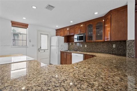 Photo of 3030 Marcos Dr #T203, Aventura, FL 33160 (MLS # A11865427)