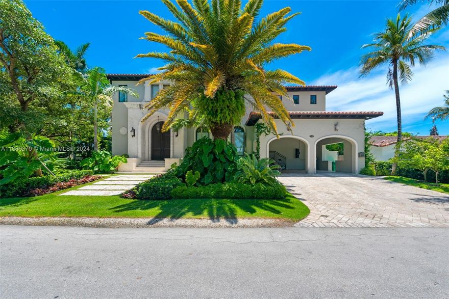 This spectacular, one-of-a-kind residence on Buttonwood Drive sits on a prime corner, boasting an oversized 9,730 sq. ft. lot (per owner’s survey). With 5 spacious bedrooms and 5.5 well-appointed baths, this home’s exceptional floor plan offers soaring ceilings and beautifully defined spaces, perfect for an elevated island lifestyle. The expansive living room, elegant dining area, and inviting family room blend seamlessly, while the gourmet kitchen opens to a gorgeous outdoor area filled with natural light. The lush backyard is a true oasis, featuring an oversized pool, expansive terrace, and summer kitchen. A large master suite serves as a serene retreat with great closet spaces. This home embodies the essence of Key Biscayne living.