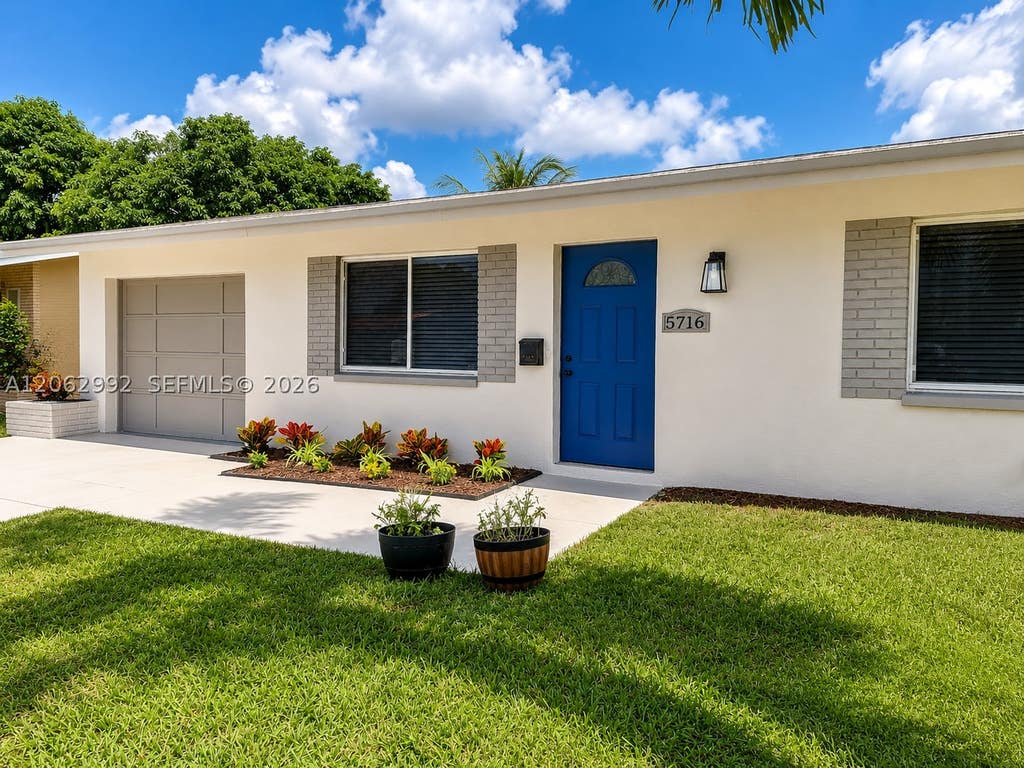 Photo of 5716 NW 70th Ter, Tamarac, FL 33321 (MLS # A12062992)
